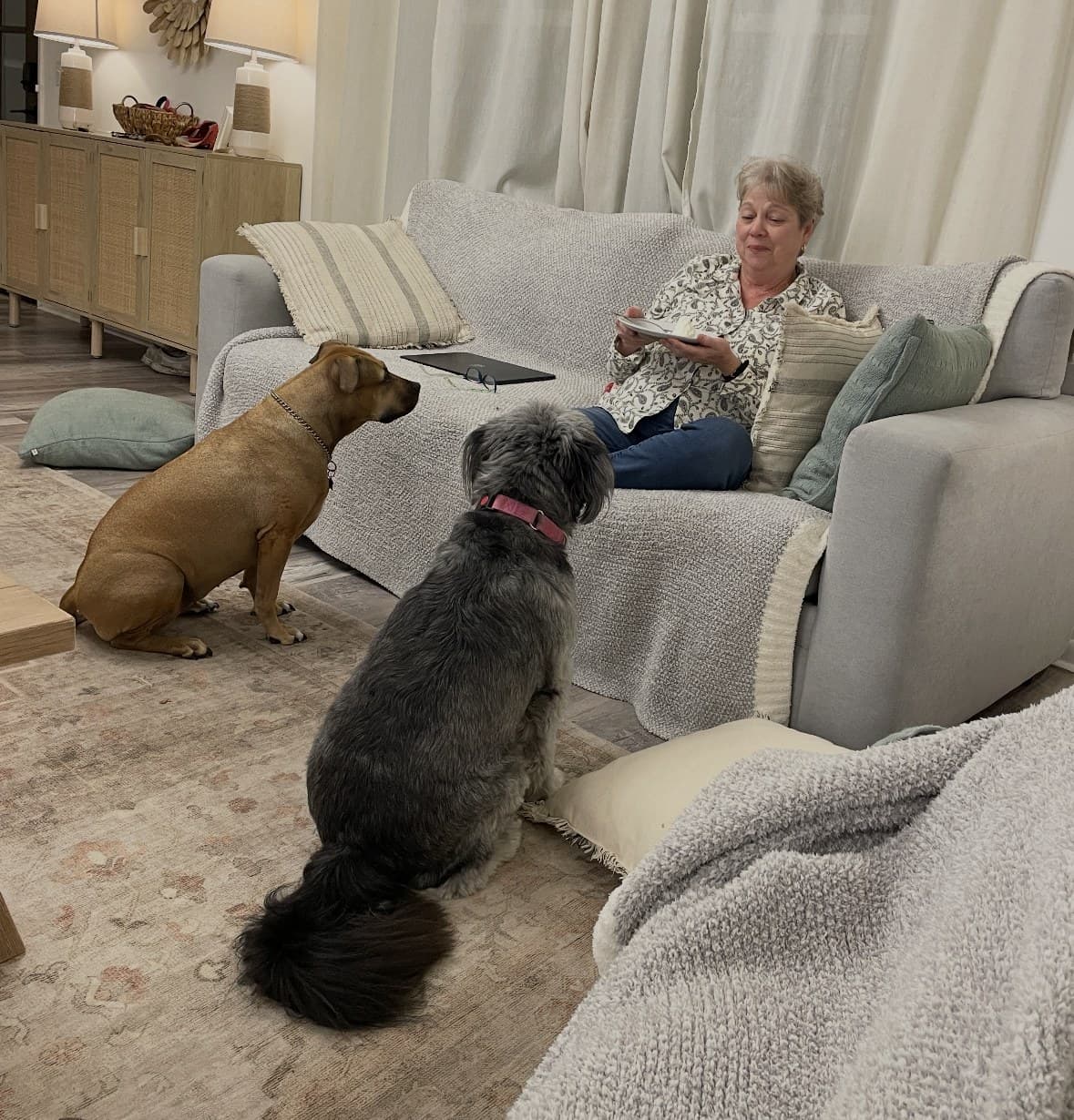 Barbera Secrist Schmedes, founder of Tillie's Safe Haven, at home with Tillie and a rescued companion
